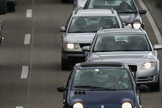 Cars Crawl Along In A Traffic Jam Cars Crawl Along In A Traffic Jam
