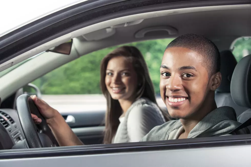 Teenagers Driving a Car